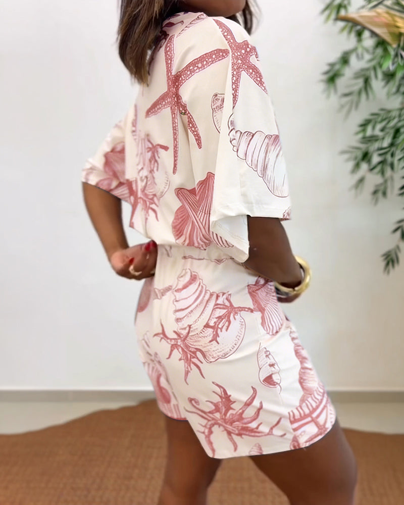 Lyrithia | Jumpsuit met V-hals en strandprint voor dames – Korte zomerjumpsuit