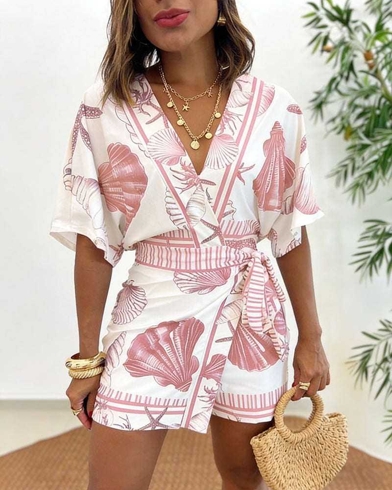 Lyrithia | Jumpsuit met V-hals en strandprint voor dames – Korte zomerjumpsuit