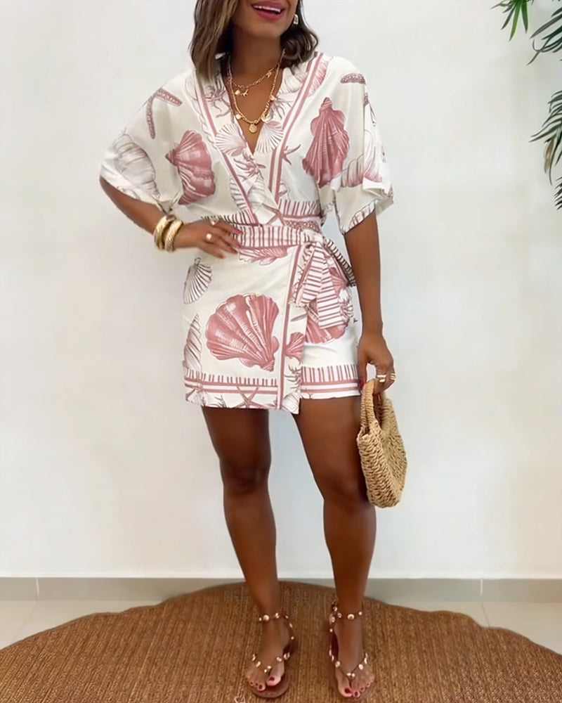 Lyrithia | Jumpsuit met V-hals en strandprint voor dames – Korte zomerjumpsuit