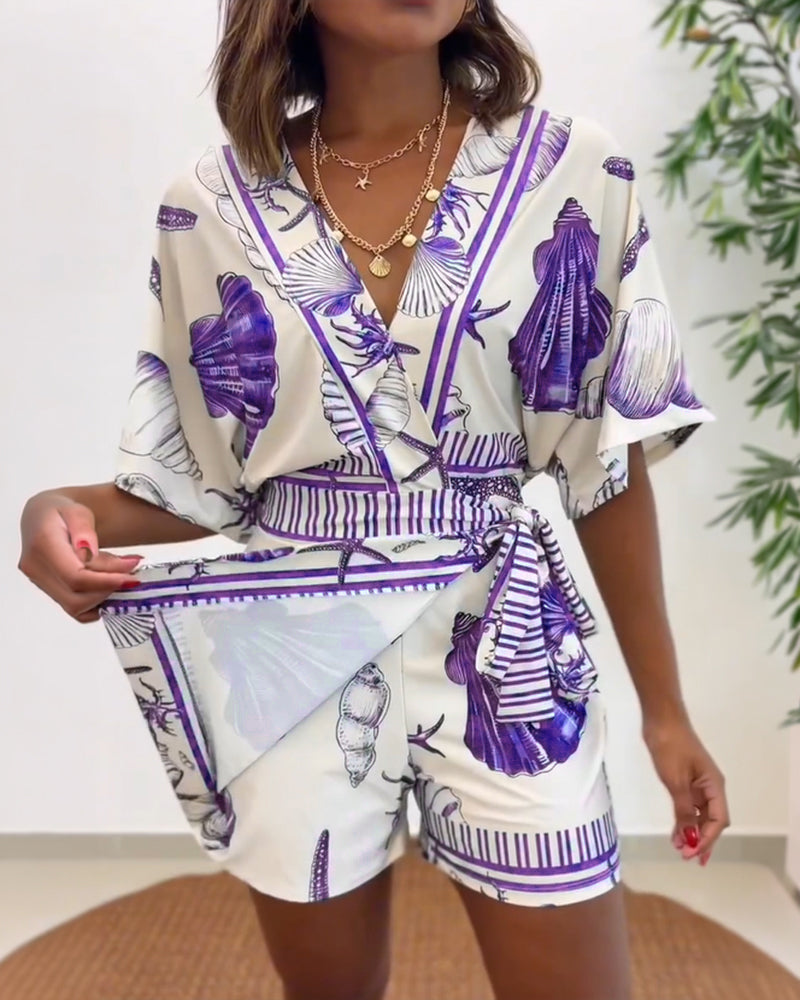 Lyrithia | Jumpsuit met V-hals en strandprint voor dames – Korte zomerjumpsuit
