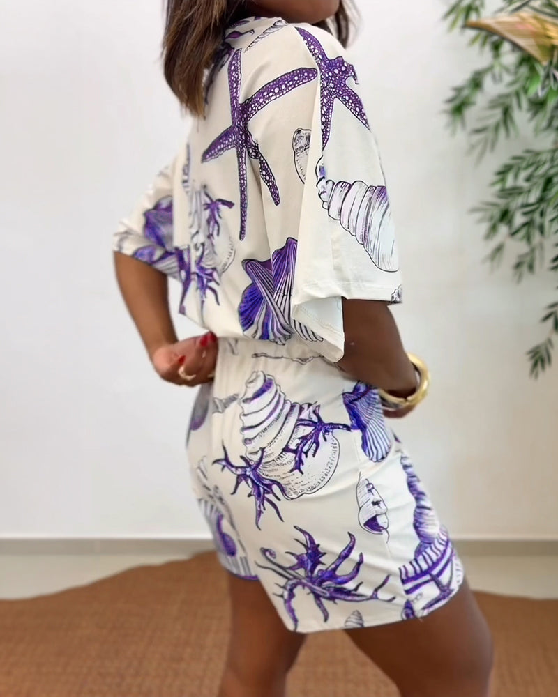 Lyrithia | Jumpsuit met V-hals en strandprint voor dames – Korte zomerjumpsuit