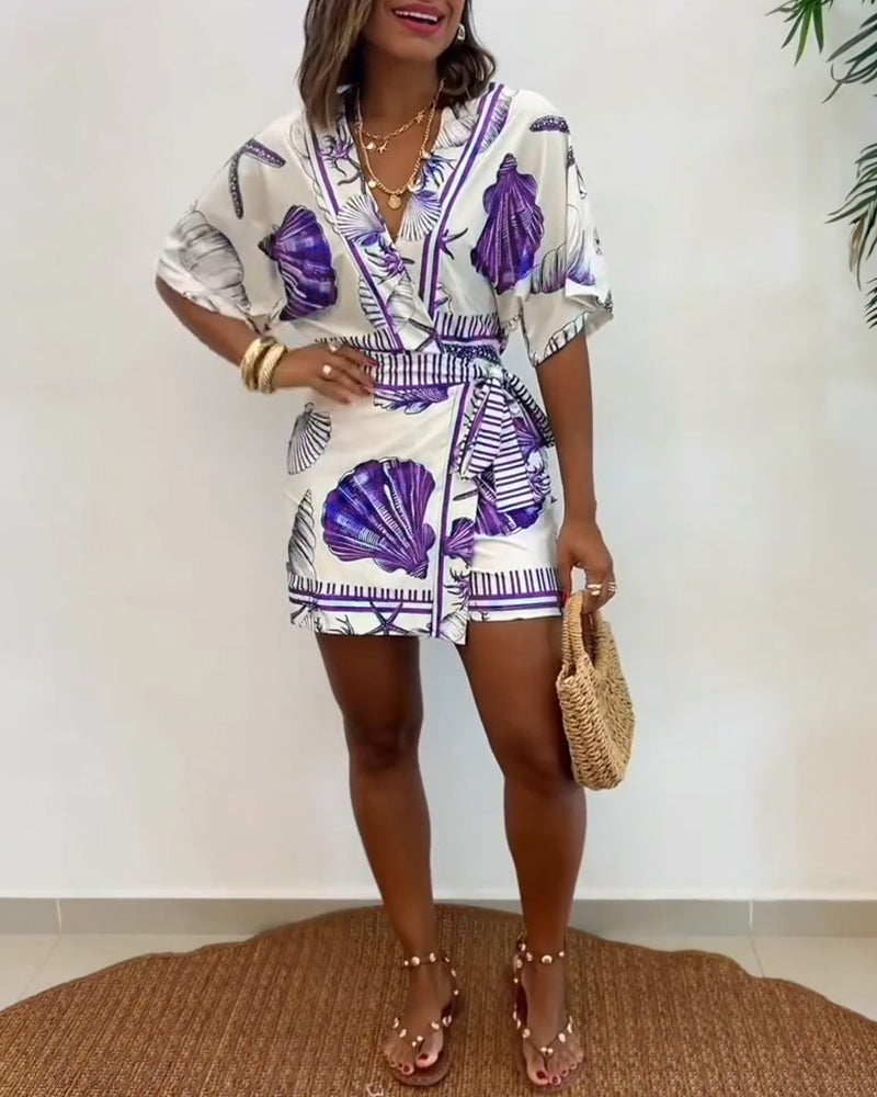 Lyrithia | Jumpsuit met V-hals en strandprint voor dames – Korte zomerjumpsuit