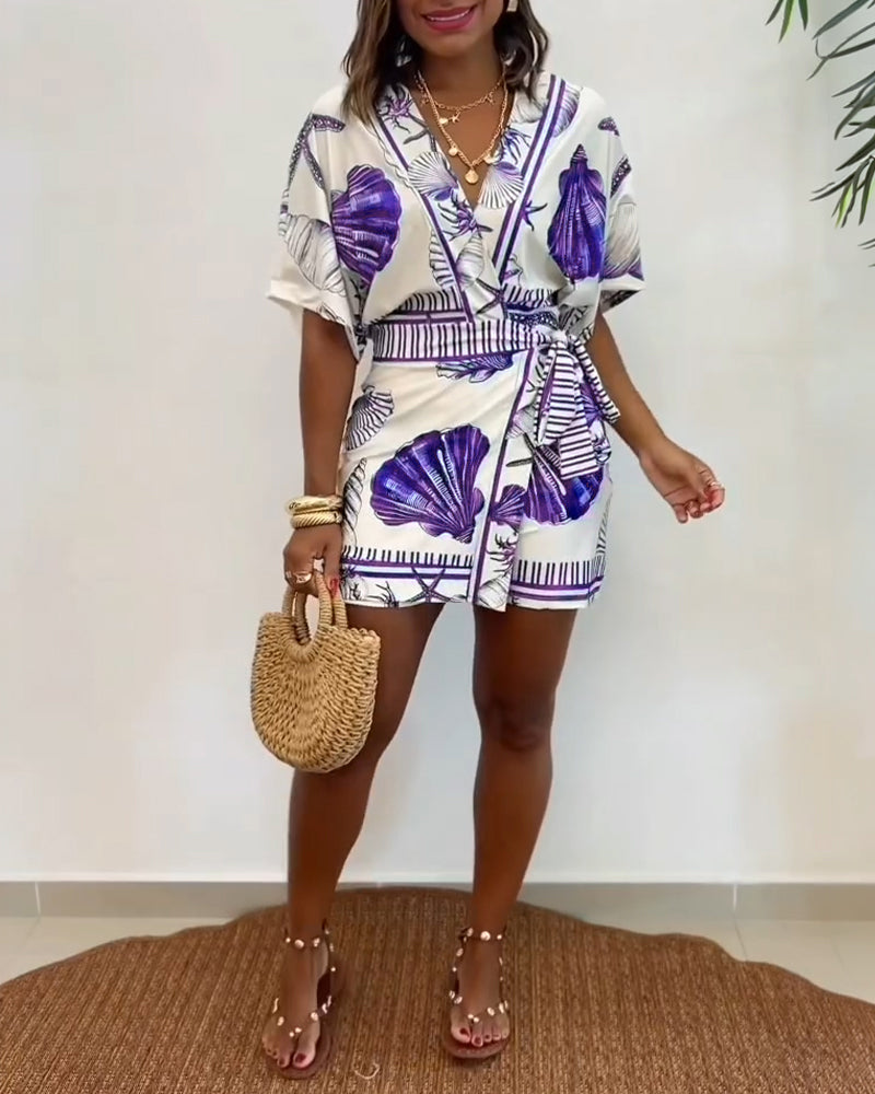 Lyrithia | Jumpsuit met V-hals en strandprint voor dames – Korte zomerjumpsuit