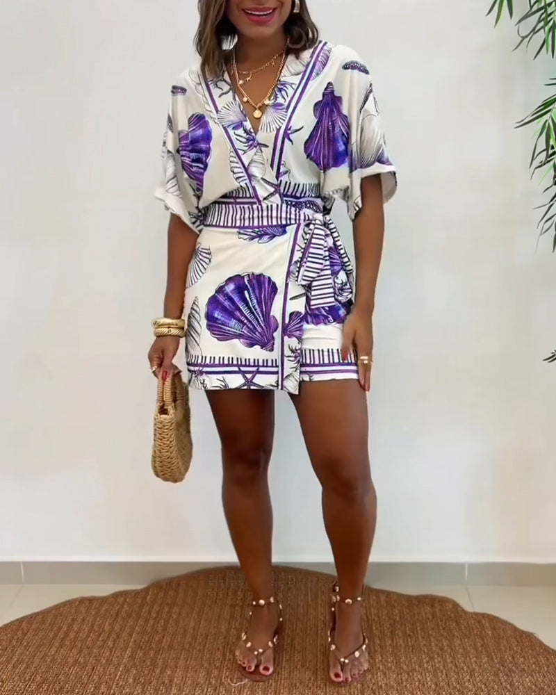 Lyrithia | Jumpsuit met V-hals en strandprint voor dames – Korte zomerjumpsuit
