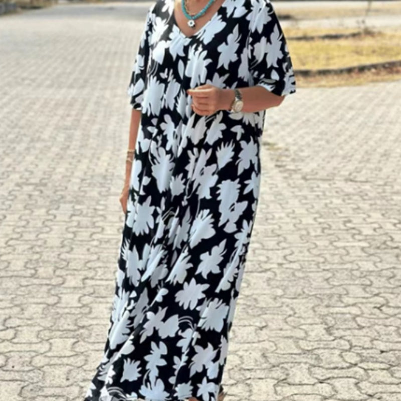 Kaelithra | Elegante maxi-jurk met print en V-hals voor dames