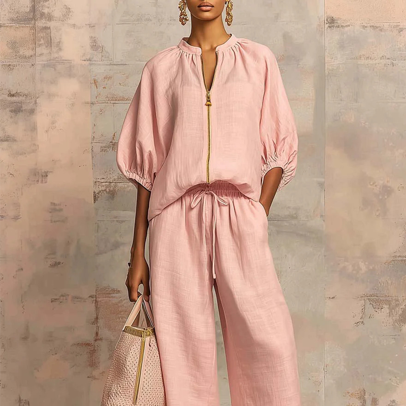 Elzoria | Elegante tweedelige damesoutfit: top met pofmouwen en palazzo-broek met wijde pijpen