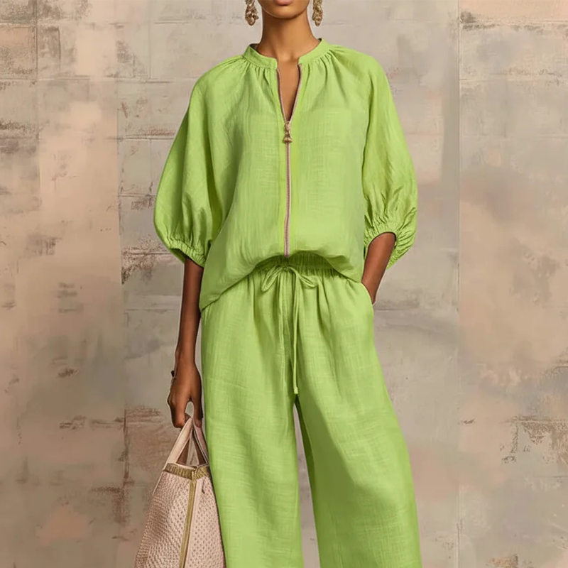 Elzoria | Elegante tweedelige damesoutfit: top met pofmouwen en palazzo-broek met wijde pijpen
