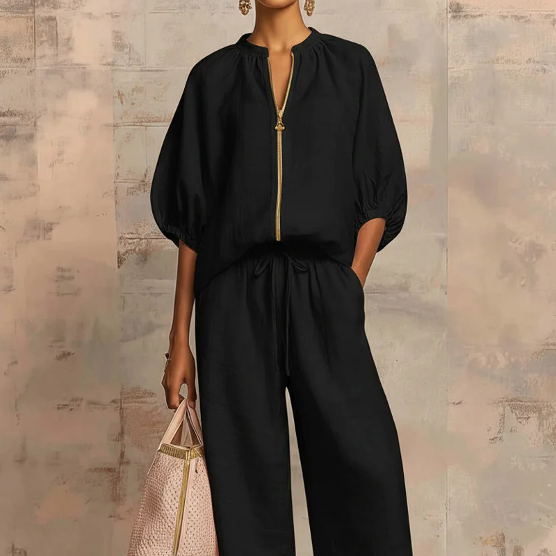 Elzoria | Elegante tweedelige damesoutfit: top met pofmouwen en palazzo-broek met wijde pijpen
