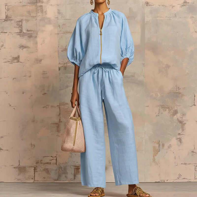 Elzoria | Elegante tweedelige damesoutfit: top met pofmouwen en palazzo-broek met wijde pijpen