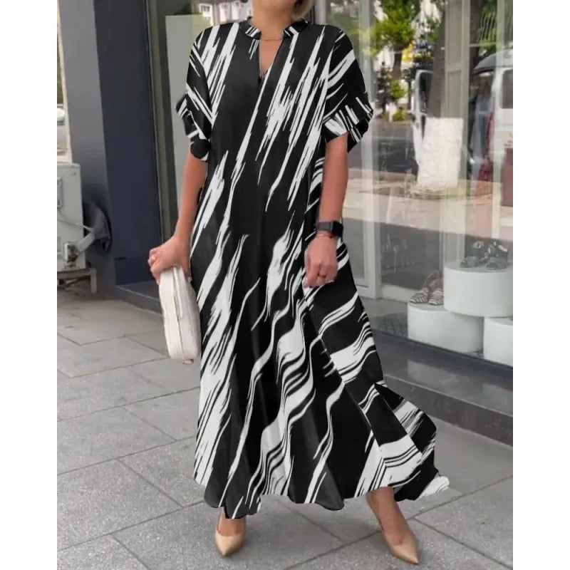 Naela | Gestreepte lange zomerjurk – Lichte maxi-strandoutfit voor dames