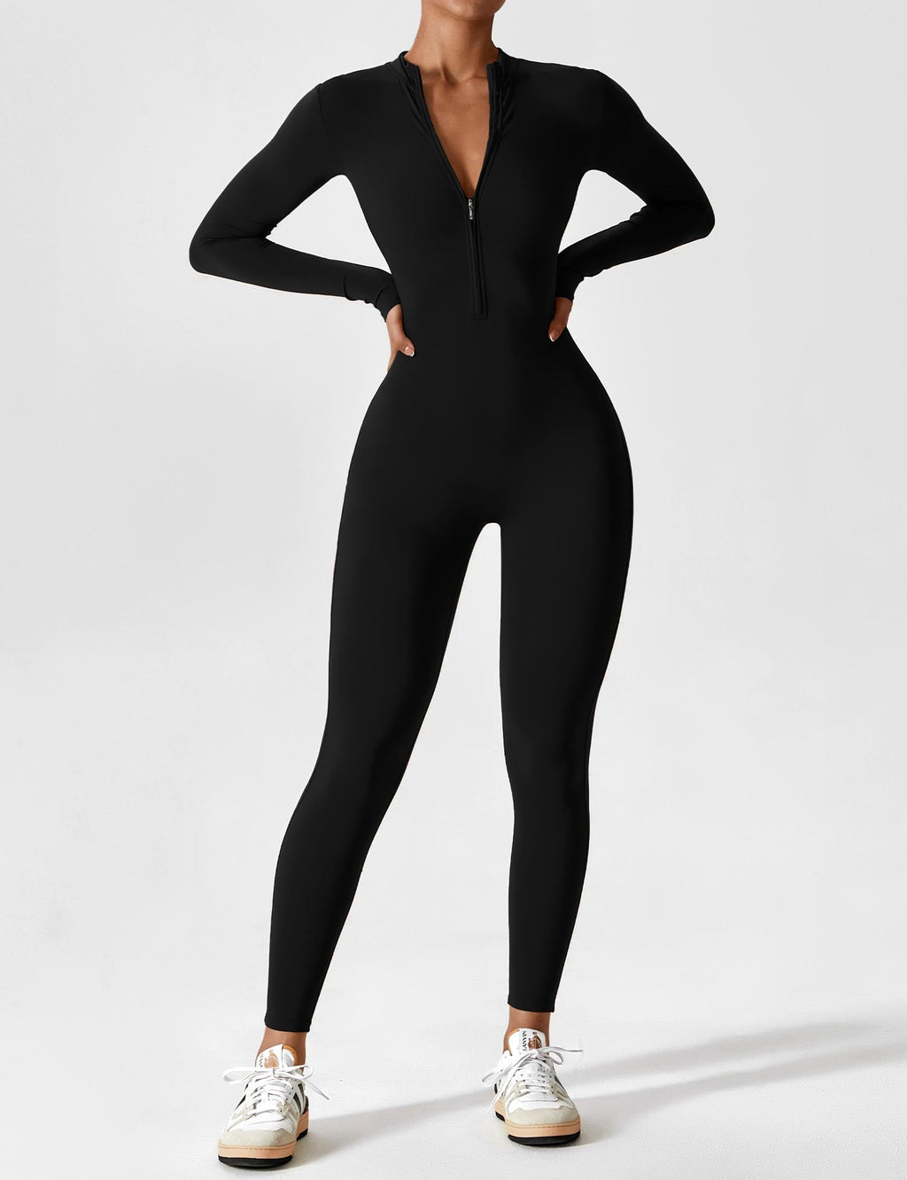 Tahlivra | Figurbetonter Jumpsuit mit Reißverschluss – Sportbody mit langen Ärmeln, schmale Passform