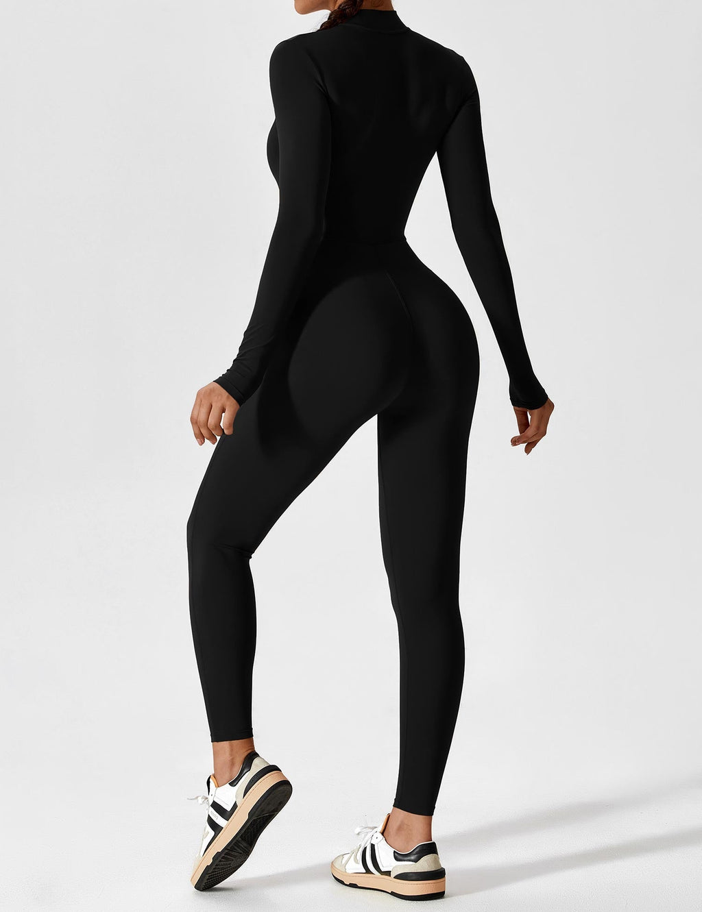 Tahlivra | Figurbetonter Jumpsuit mit Reißverschluss – Sportbody mit langen Ärmeln, schmale Passform