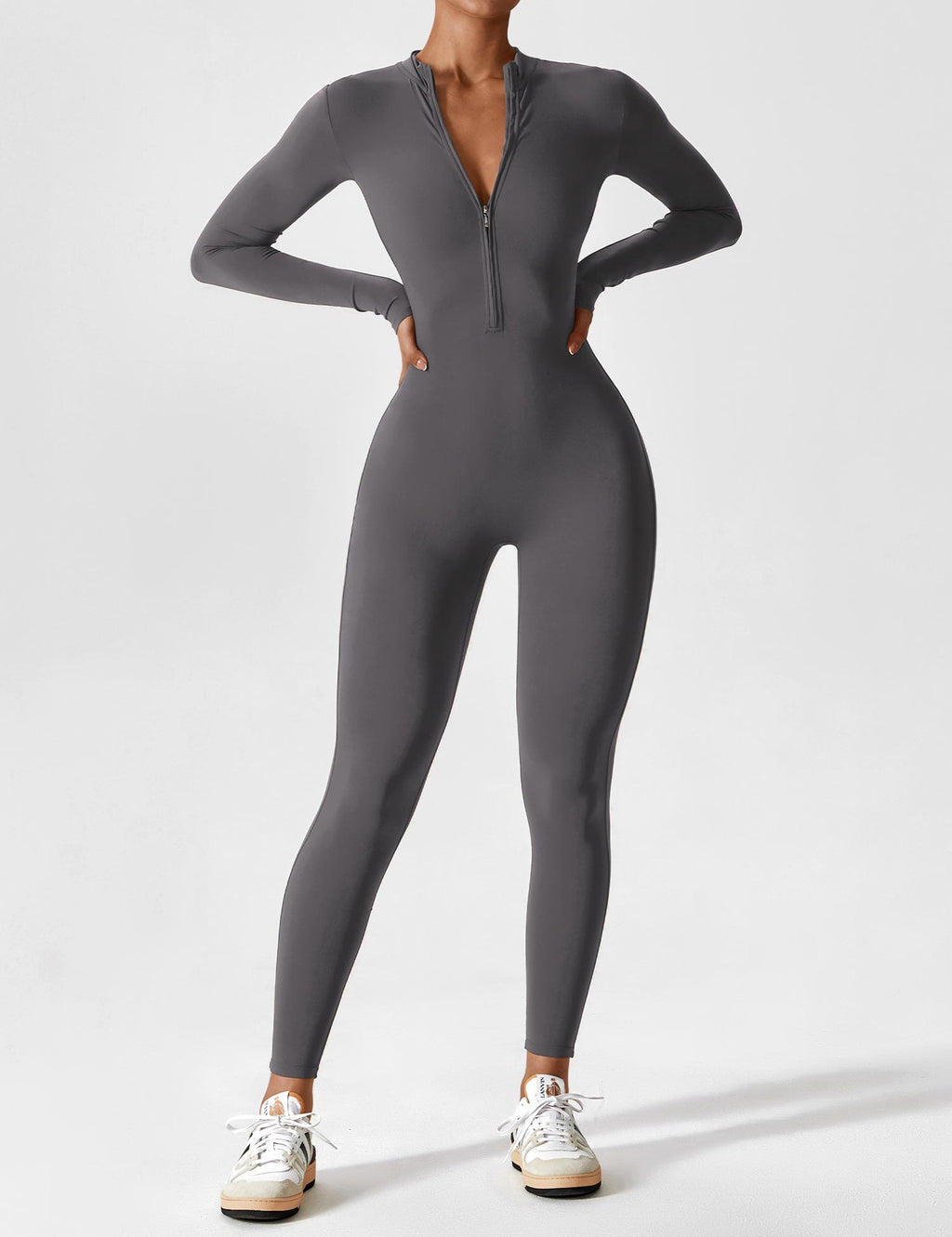 Tahlivra | Figurbetonter Jumpsuit mit Reißverschluss – Sportbody mit langen Ärmeln, schmale Passform